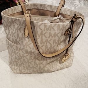 Michael Kors canvas shoulder bag.